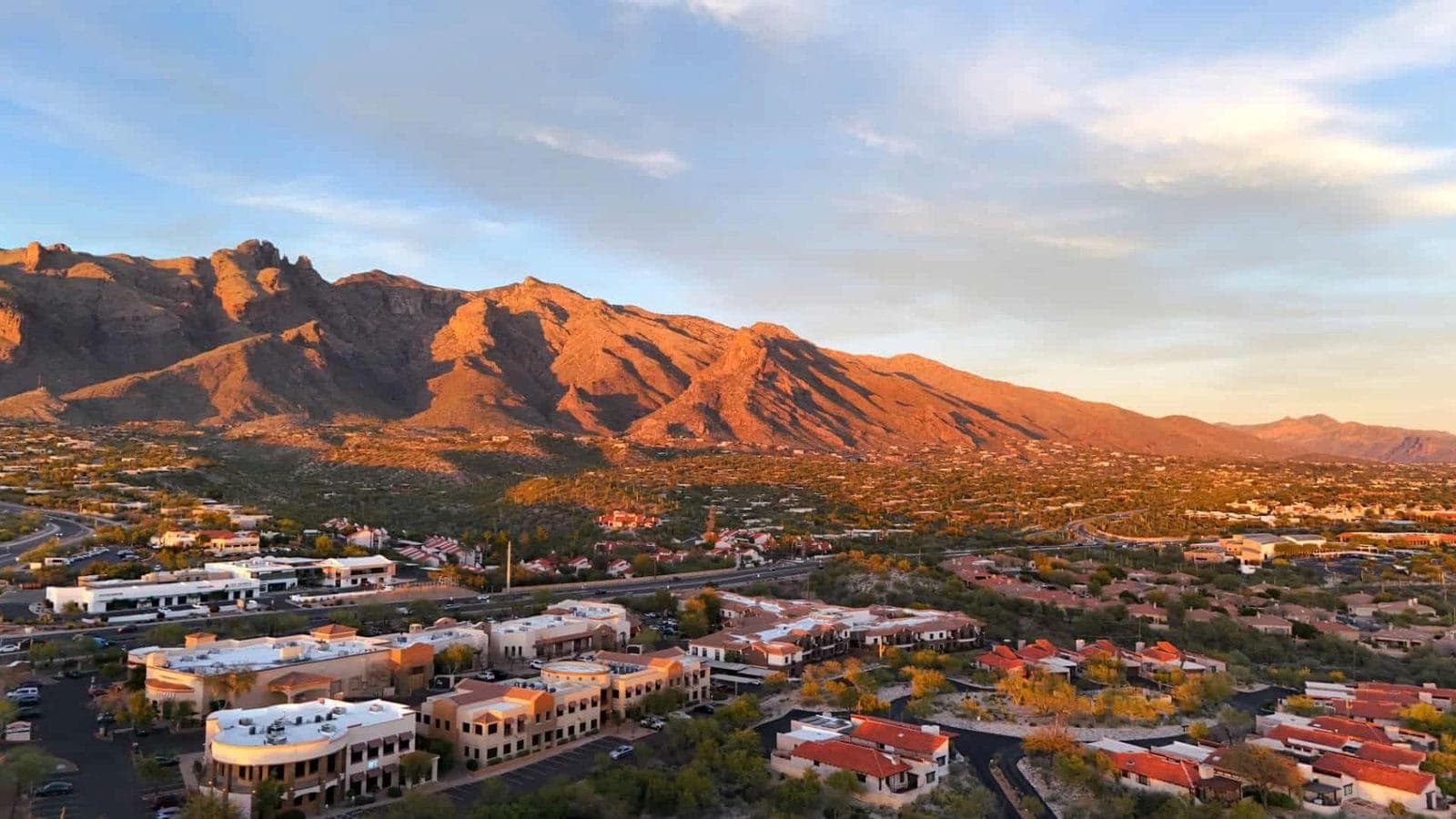 Office buildings in the Catalina Foothills with the Santa Catalina Mountains lit at sunset